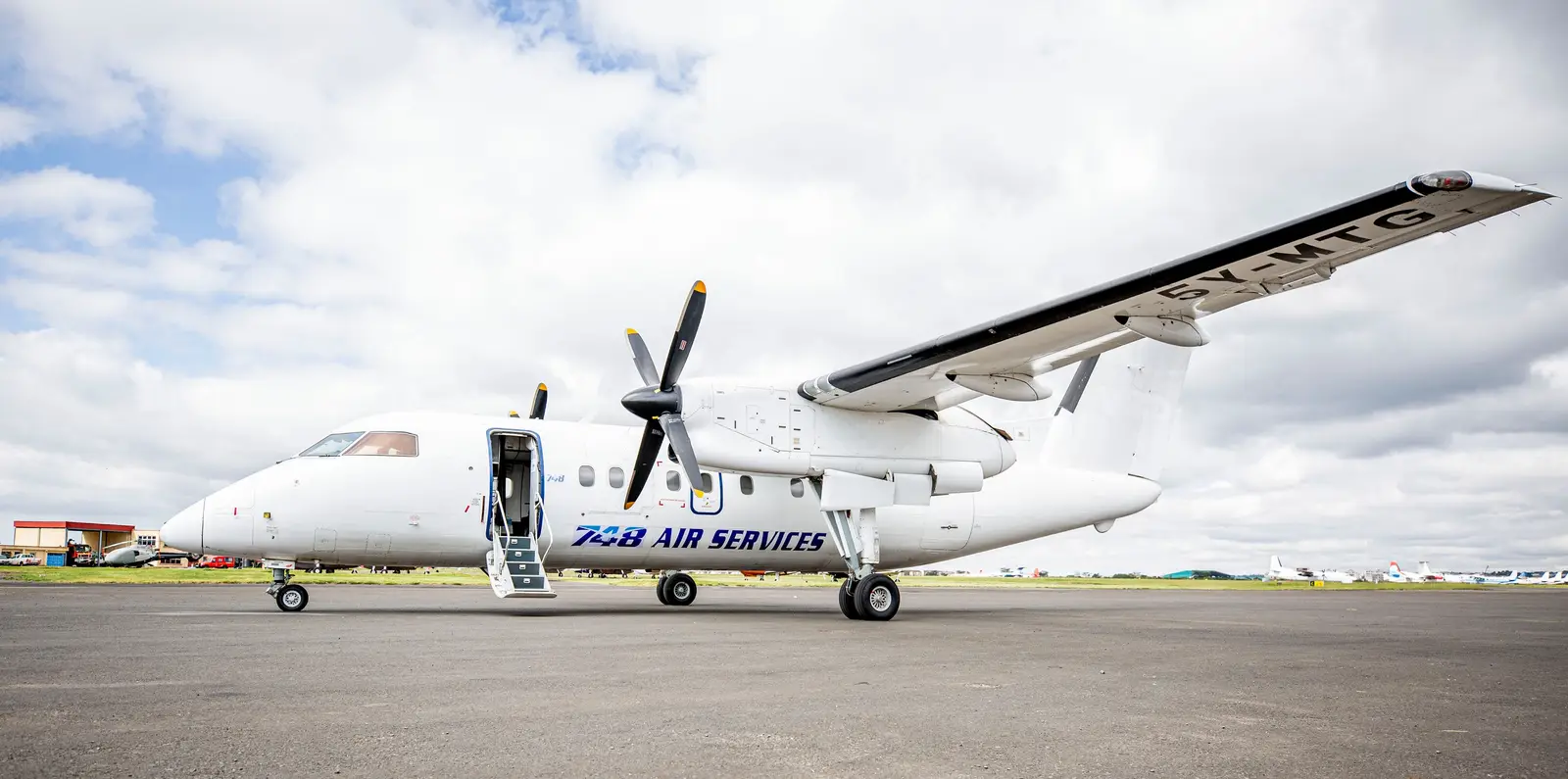 De Havilland DHC-8-102 5Y-MTG operated by 748 Air Services (K), Ltd., exterior