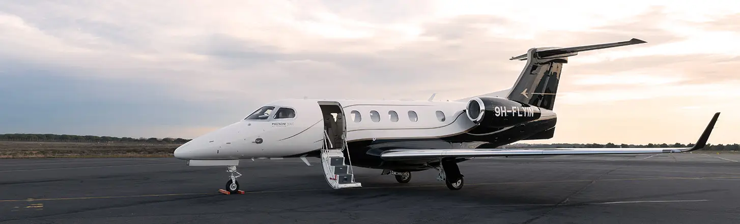 Embraer Phenom 300E 9H-FLYIN operated by TAG Aviation photo 5