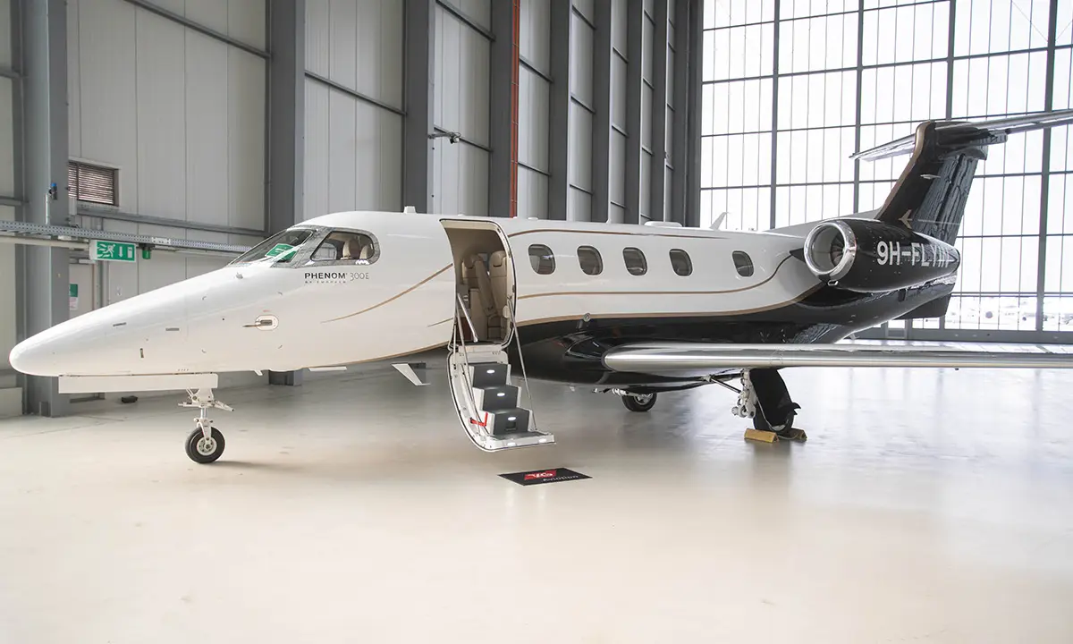 Embraer Phenom 300E 9H-FLYIN operated by TAG Aviation photo 2