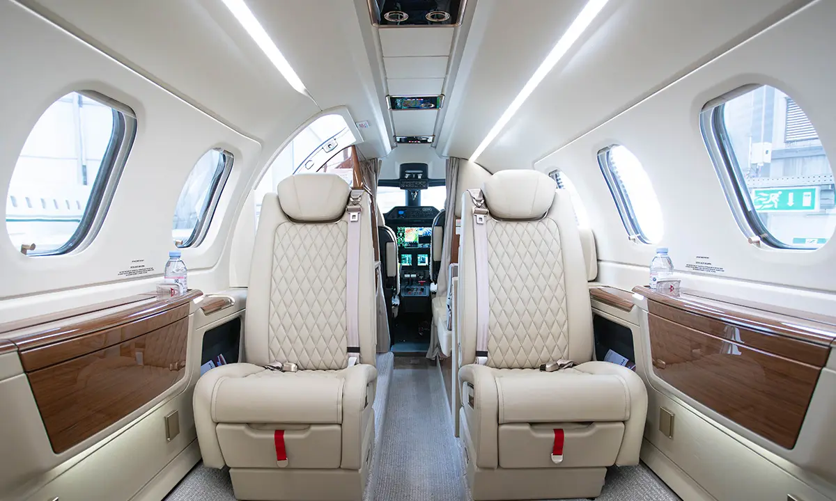 Embraer Phenom 300E 9H-FLYIN operated by TAG Aviation photo 4