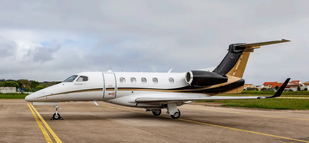 Embraer Phenom 300 CS-LPA operated by AMC Aviation photo 4