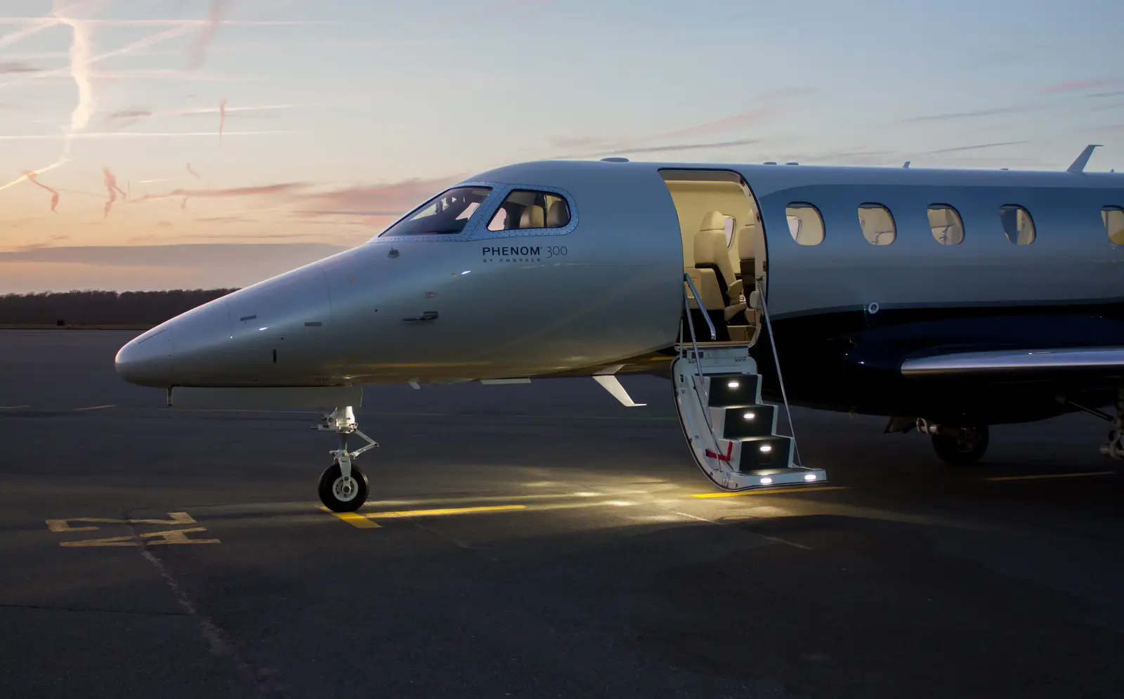 Embraer Phenom 300 D-CAGA operated by PAD Aviation Service GmbH photo 6