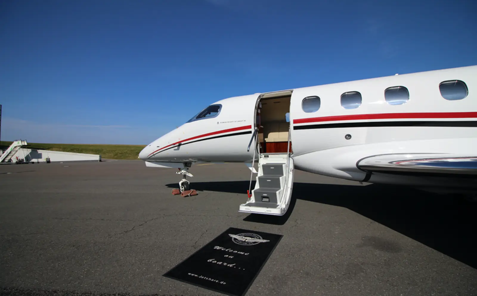 Embraer Phenom 300 D-CBBS operated by PAD Aviation Service GmbH photo 4