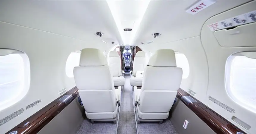 Embraer Phenom 300 D-CMXM operated by Vistajet photo 5