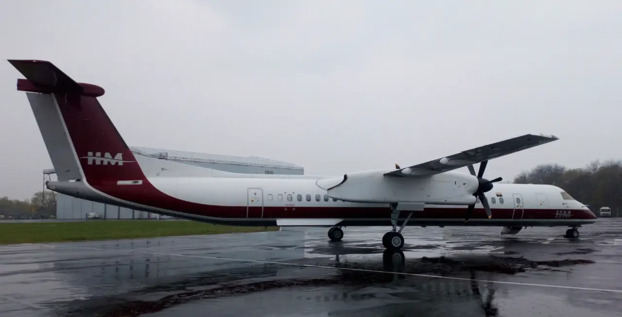 De Havilland DHC-8-Q400 D2-EUQ operated by Heli Malongo photo 2