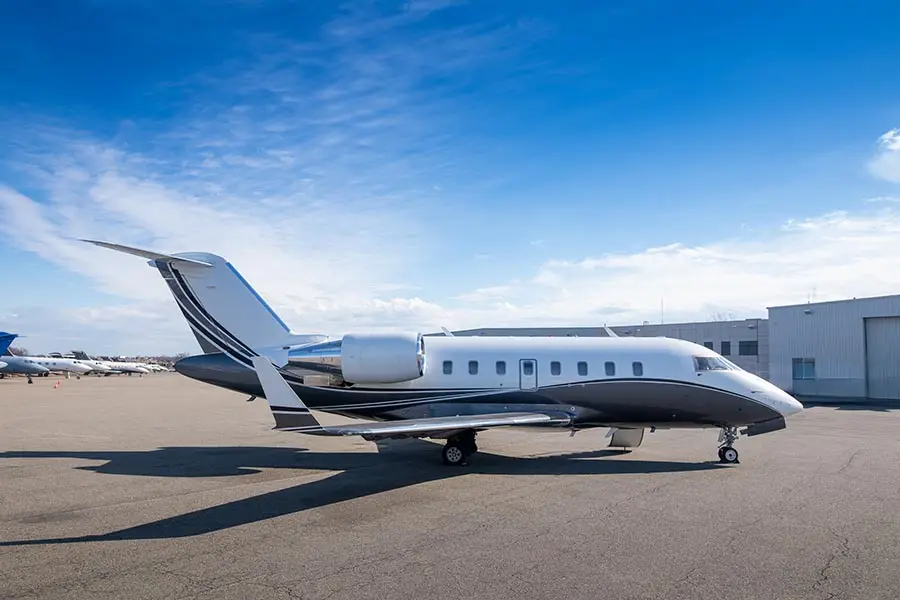 Bombardier Challenger 605 N111RZ operated by NeaJets photo 4