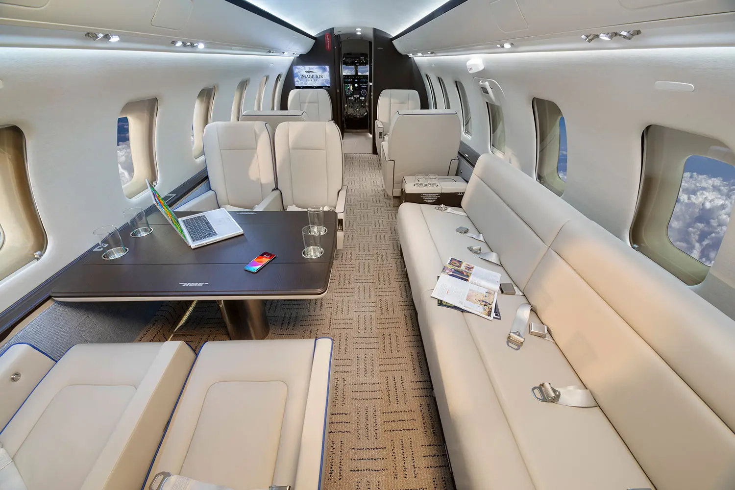 Bombardier Challenger 605 N138DM operated by Image Air Charter photo 3