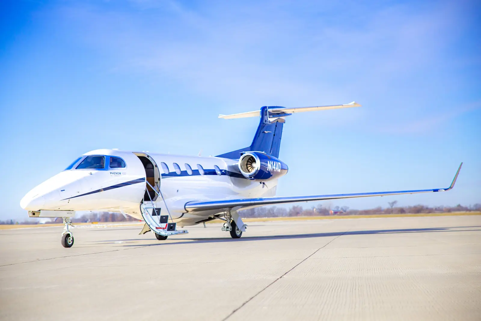 Embraer Phenom 300 N14AQ operated by Maxair, LLC, exterior