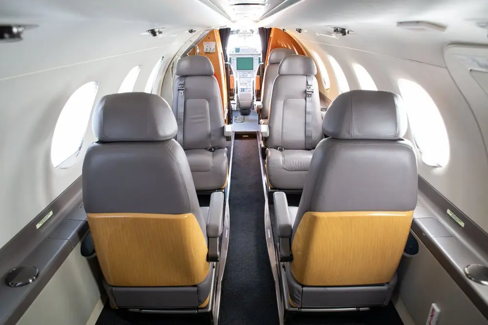 Embraer Phenom 300 N14AQ operated by Maxair, LLC photo 5