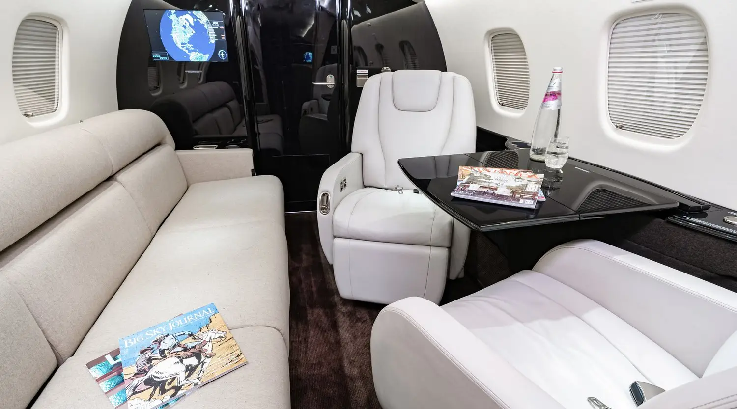 Embraer Legacy 650 N1955J operated by Elite Air, Inc. photo 6