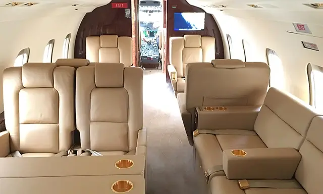 Bombardier Challenger 604 N243BA operated by West Coast Aviation Services, KSNA photo 3