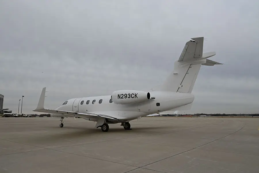 Embraer Phenom 300E N293CK operated by Integrated Flight Resources, Inc., KDPA photo 6
