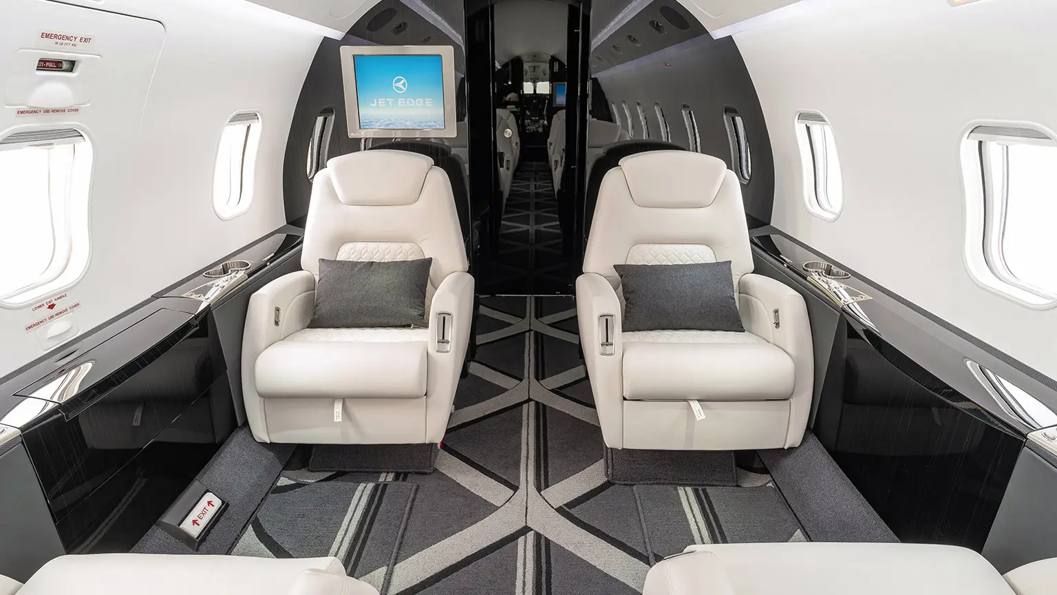 Bombardier Challenger 300 N303JE operated by Jet Edge International, KCBM photo 4