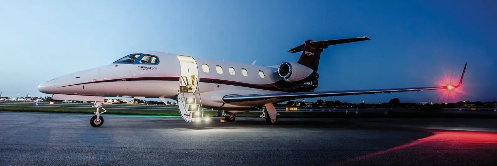 Embraer Phenom 300 N317N operated by Nicholas Air photo 6