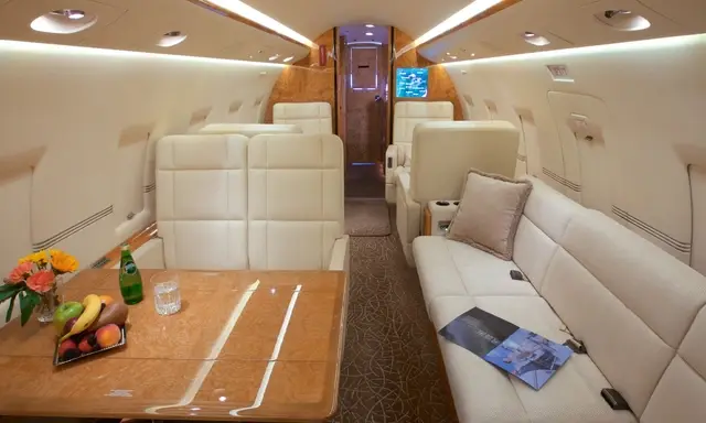 Bombardier Challenger 604 N327TW operated by New World Aviation, Inc. photo 2