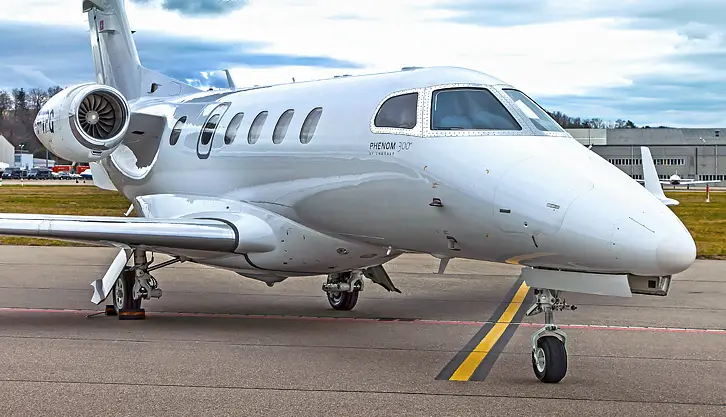 Embraer Phenom 300 N329MC operated by Gold Aviation Services, exterior