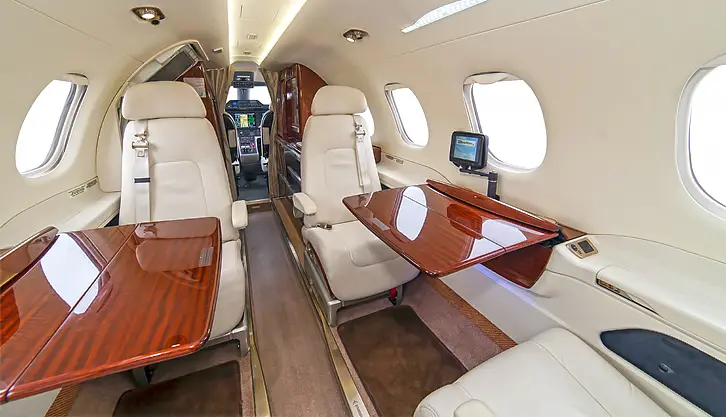 Embraer Phenom 300 N329MC operated by Gold Aviation Services photo 3