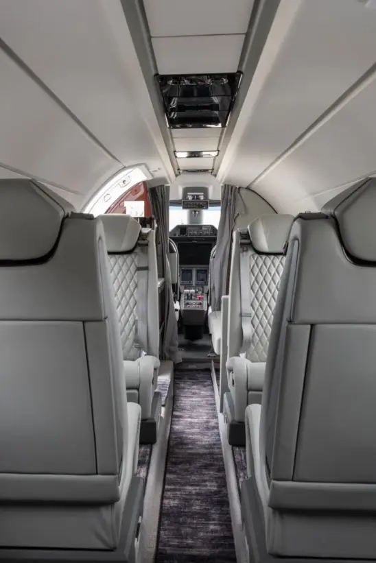 Embraer Phenom 300 N35EA operated by Synergy Flight Center, KBMI photo 2