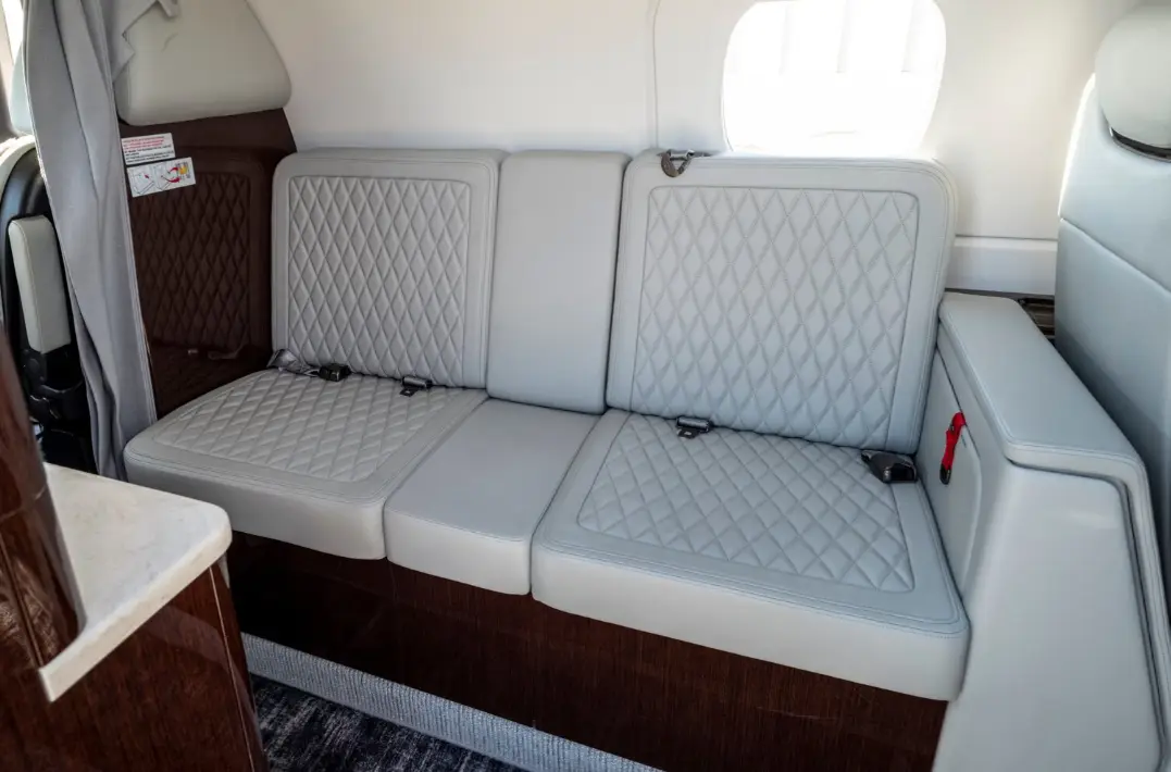 Embraer Phenom 300 N35EA operated by Synergy Flight Center, KBMI photo 3
