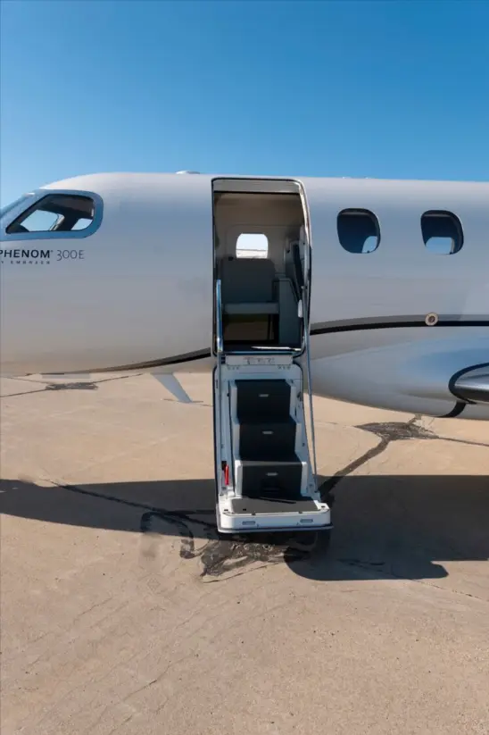 Embraer Phenom 300 N35EA operated by Synergy Flight Center, KBMI photo 6