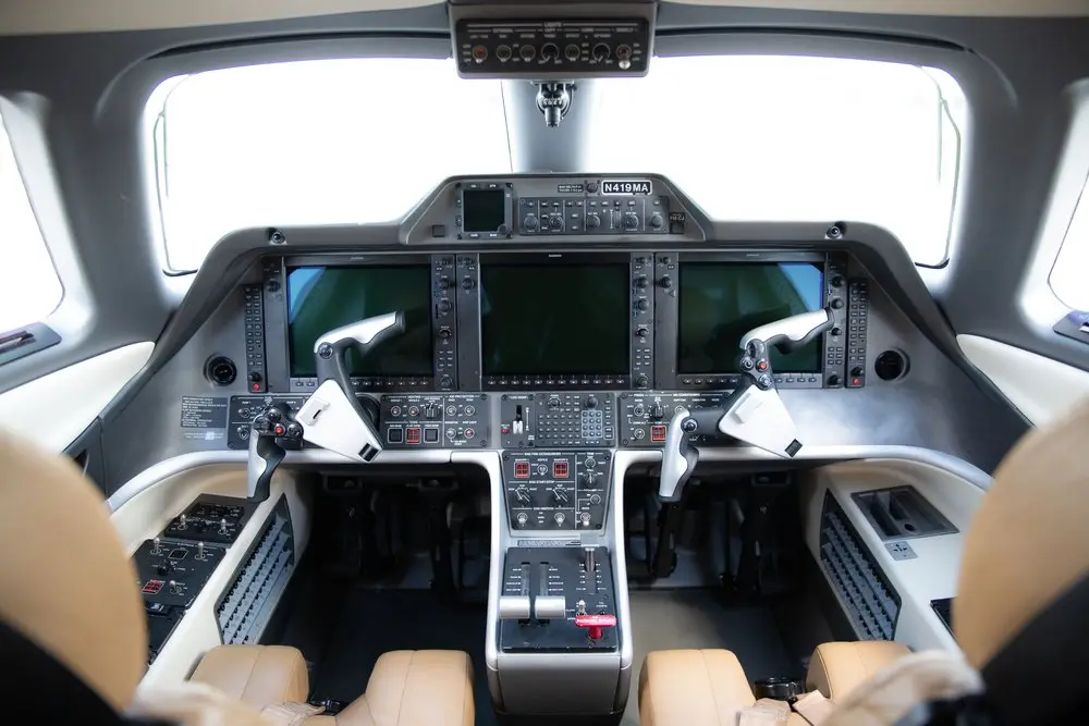 Embraer Phenom 300 N419MA operated by Maxair, LLC photo 6