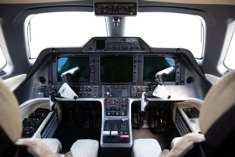 Embraer Phenom 300 N479MA operated by Maxair, LLC photo 6