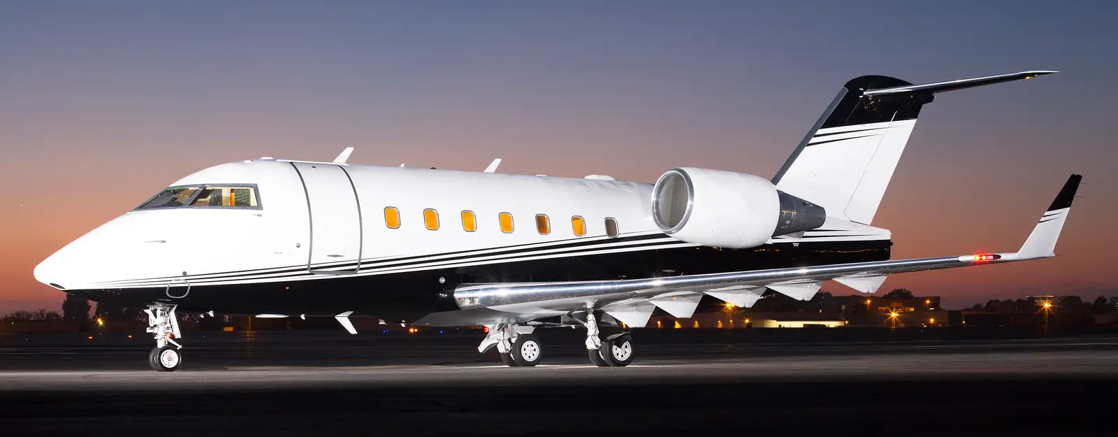 Bombardier Challenger 604 N500PV operated by Hangar 7 Aviation, KSNA, exterior