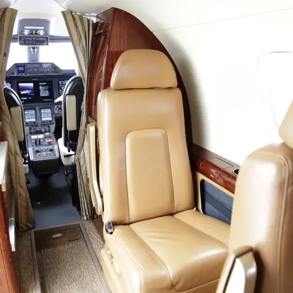 Embraer Phenom 300 N60NF operated by Latitude 33 Aviation, LLC, KCRQ photo 4