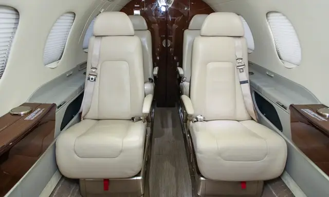 Embraer Phenom 300 N6232 operated by Mayo Aviation Inc. photo 2