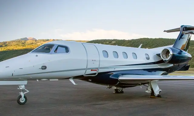 Embraer Phenom 300 N6232 operated by Mayo Aviation Inc. photo 4