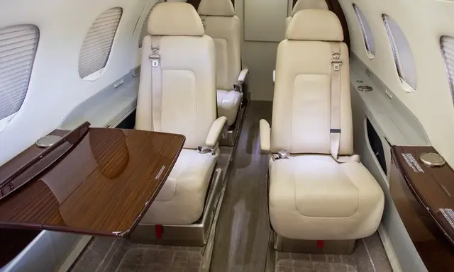 Embraer Phenom 300 N6232 operated by Mayo Aviation Inc. photo 6