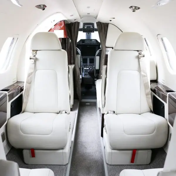 Embraer Phenom 300 N66M operated by Latitude 33 Aviation, LLC, KCRQ photo 2