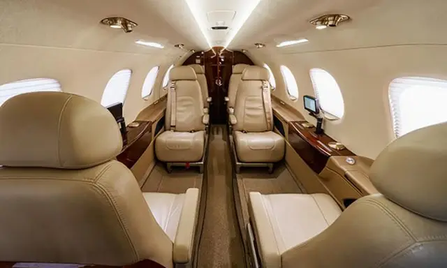 Embraer Phenom 300 N814SP operated by Silver Air photo 2