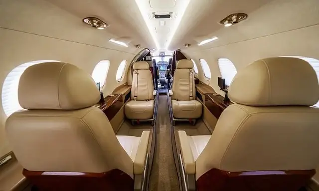 Embraer Phenom 300 N814SP operated by Silver Air photo 3