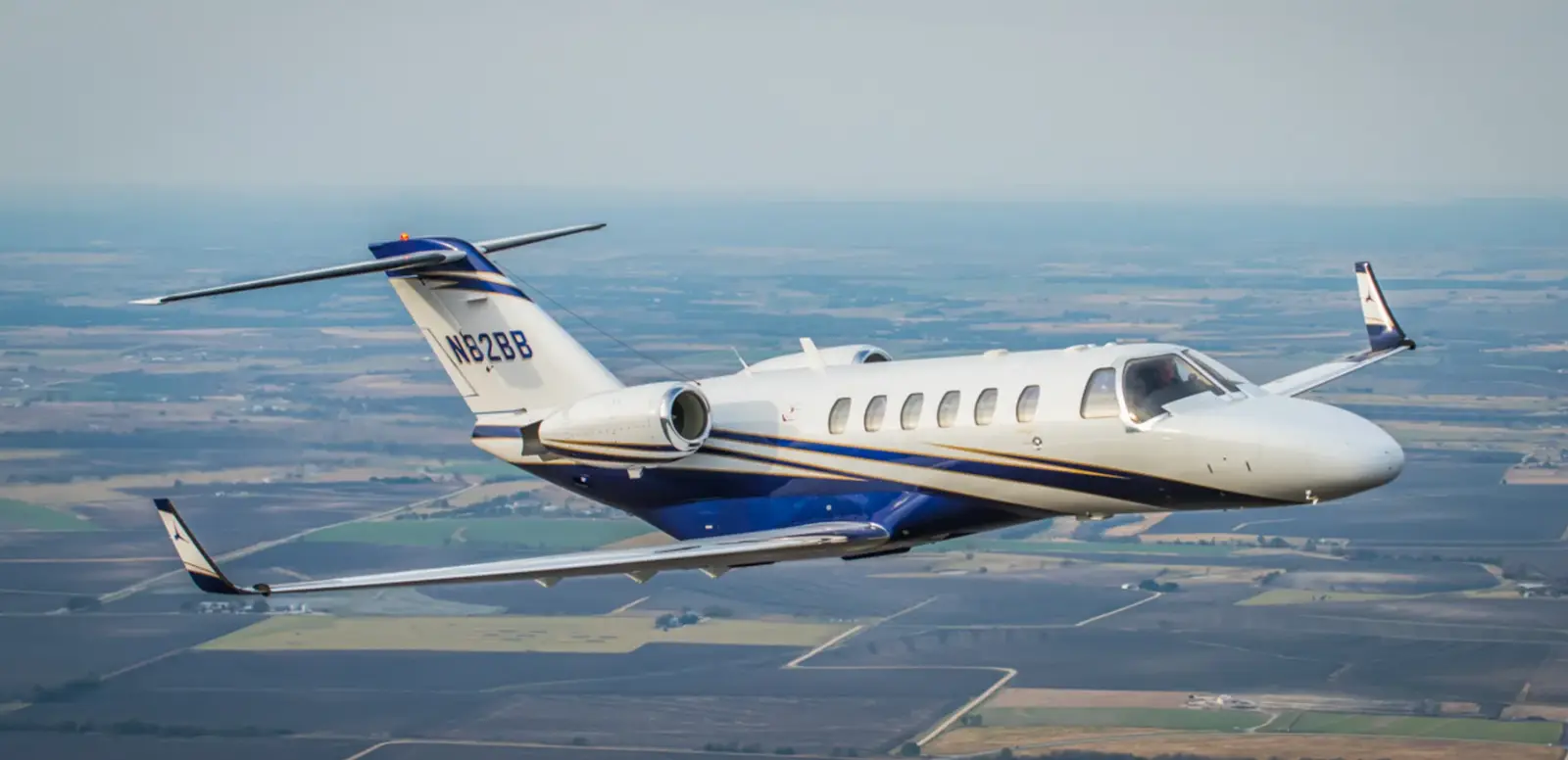 Cessna Citation CJ2 N82BB operated by Premier Air Charter, LLC, KCRQ, exterior