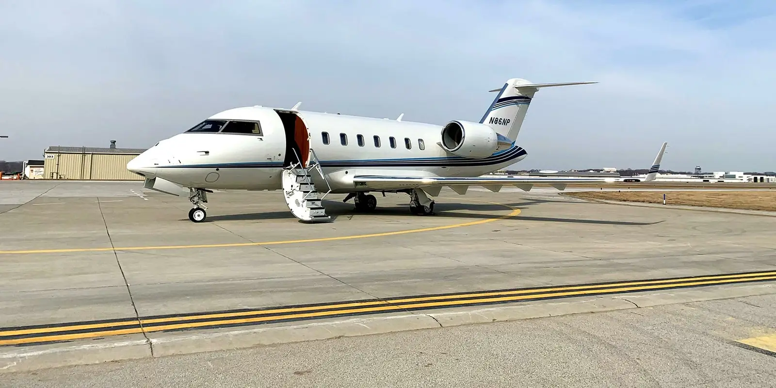 Bombardier Challenger 605 N86NP operated by Sky Quest, LLC, KCLE, exterior