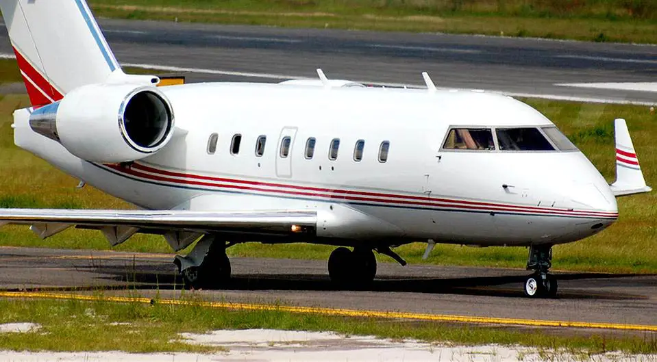 Bombardier Challenger 604 N877H operated by Jet-A, LLC photo 3