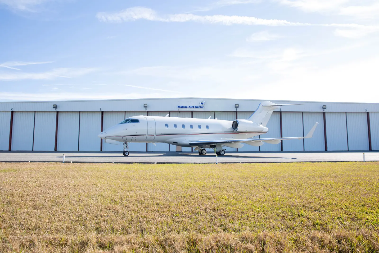 Bombardier Challenger 300 N88HD operated by Malone AirCharter, Inc. photo 2