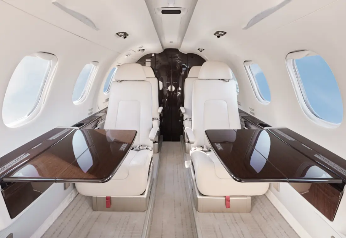 Embraer Phenom 300 N910XS operated by FlyAdvanced Aviation Group photo 2