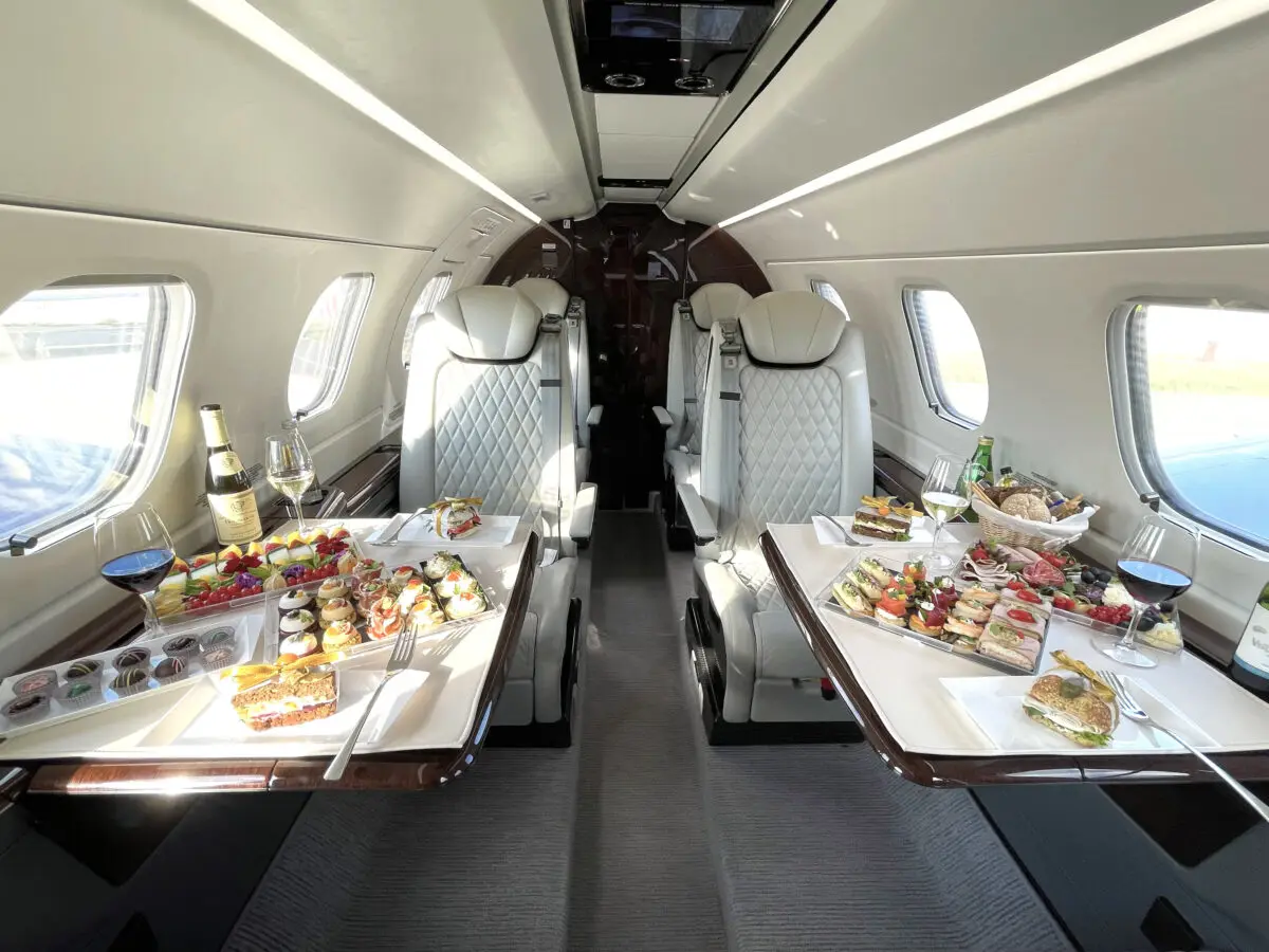 Embraer Phenom 300 OK-PHA operated by Atmospherica Aviation photo 2