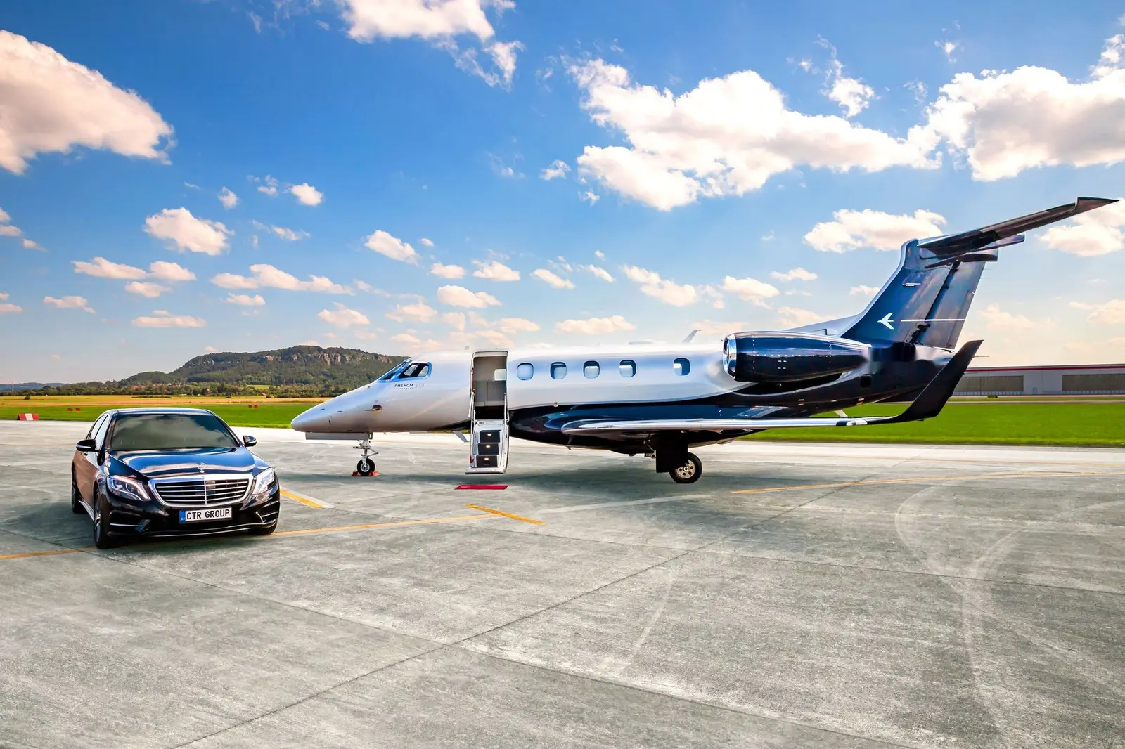 Embraer Phenom 300 OK-PHA operated by Atmospherica Aviation photo 4