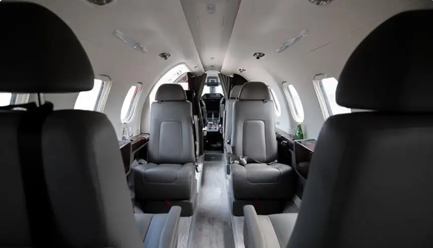 Embraer Phenom 300 OK-PHM operated by Atmospherica Aviation photo 2