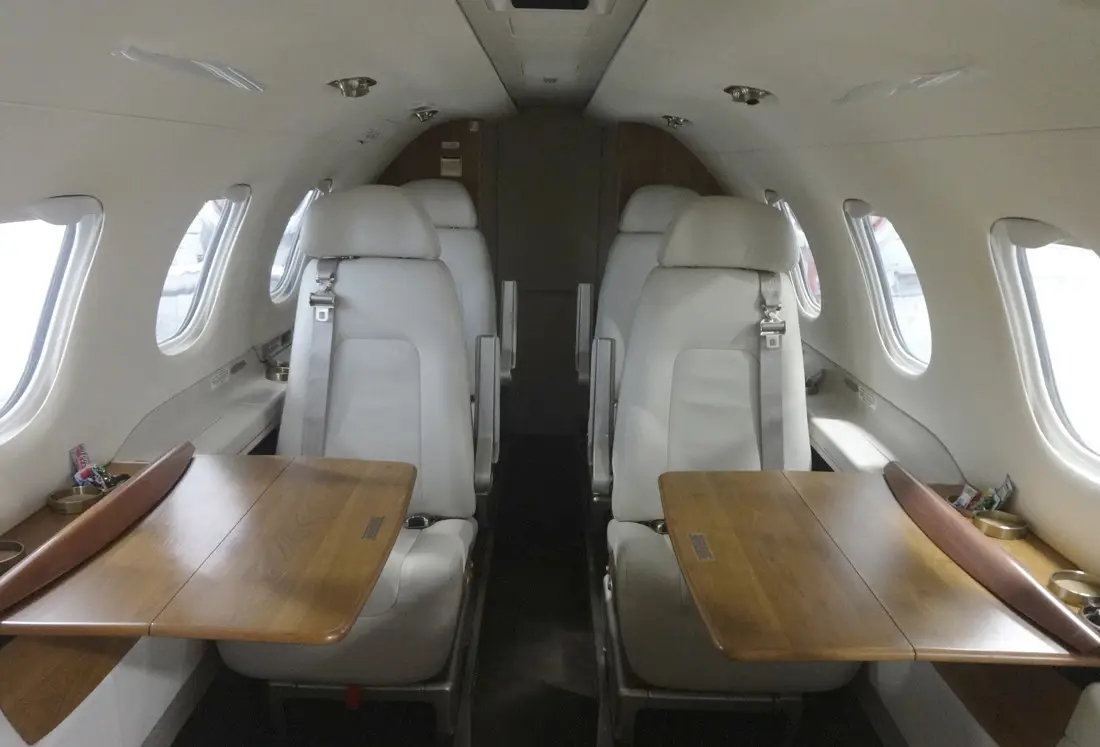 Embraer Phenom 300 PR-BLS operated by Lider Aviation photo 2