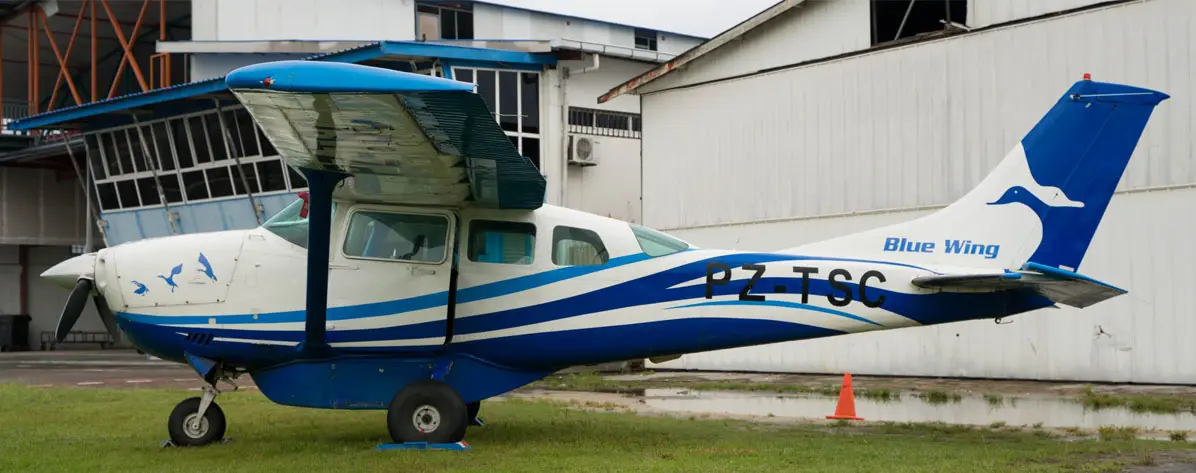 Cessna 206 PZ-TSC operated by Blue Wing Airlines, exterior