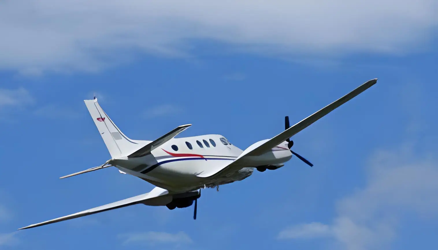 Beechcraft King Air 90 TI-AZO operated by Aerobell Air Charter photo 2