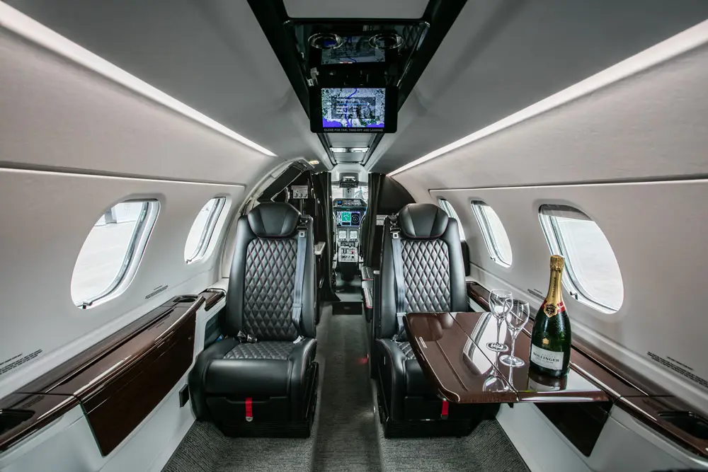 Embraer Phenom 300 VH-NSQ operated by Avcair photo 5