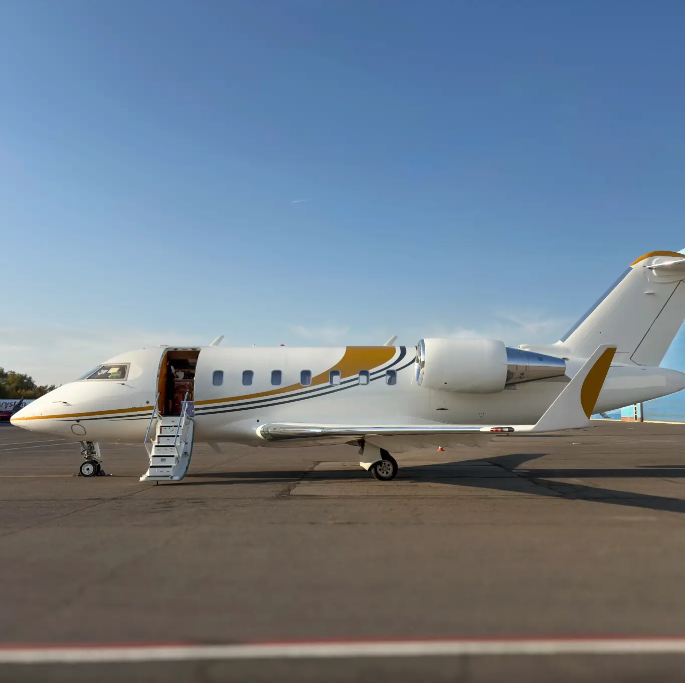 Bombardier Challenger 605 VQ-BAR operated by Comlux Aviation photo 2