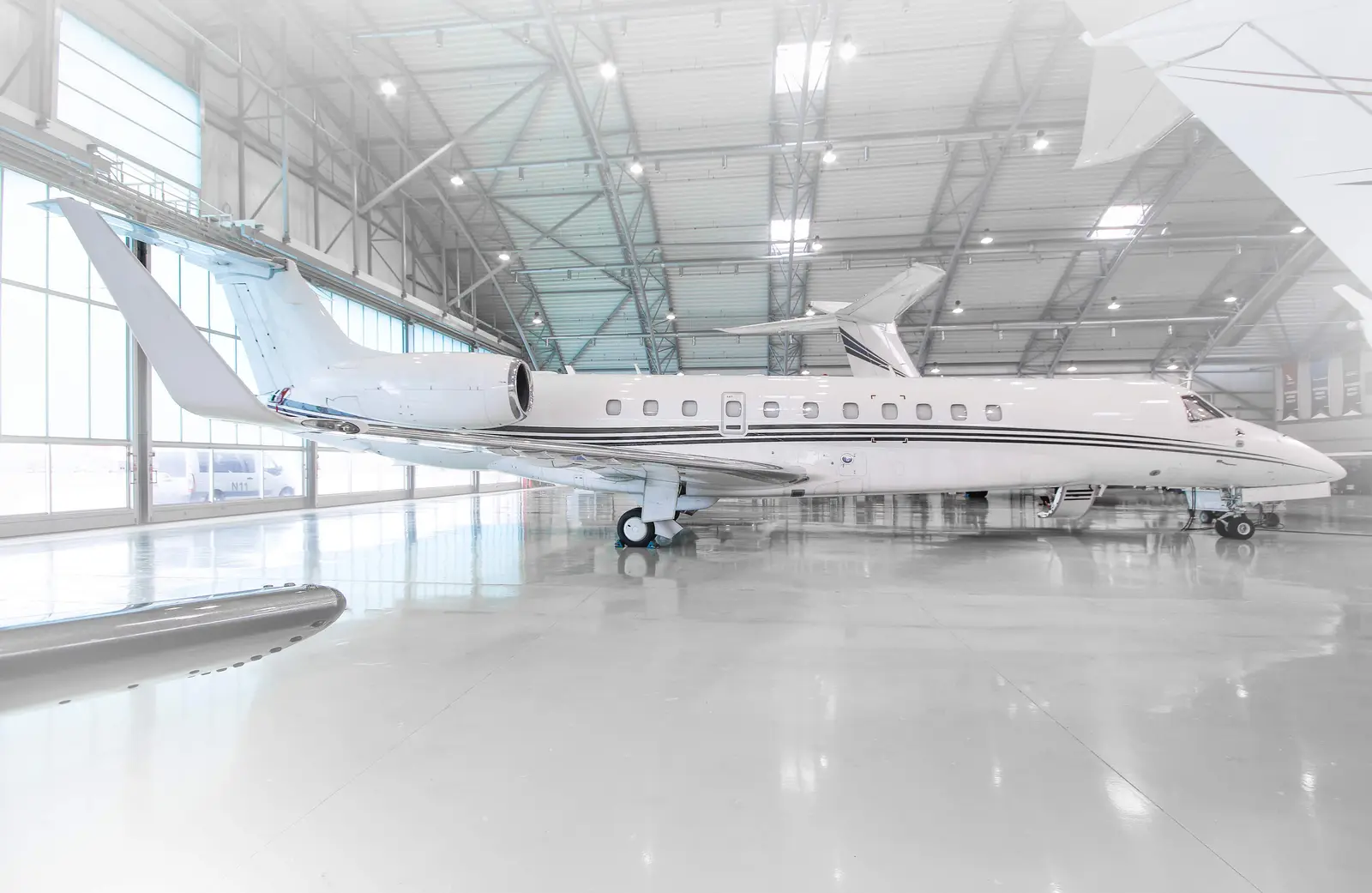 Embraer Legacy 650 VT-NKS operated by EHA Aviation Private, Ltd. photo 6