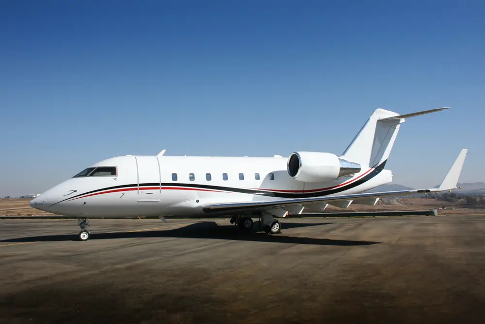 Bombardier Challenger 604 ZS-KEN operated by Luxaviation Africa photo 4