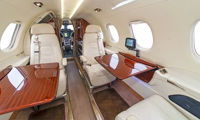 Embraer Phenom 300 N329MC photo 3